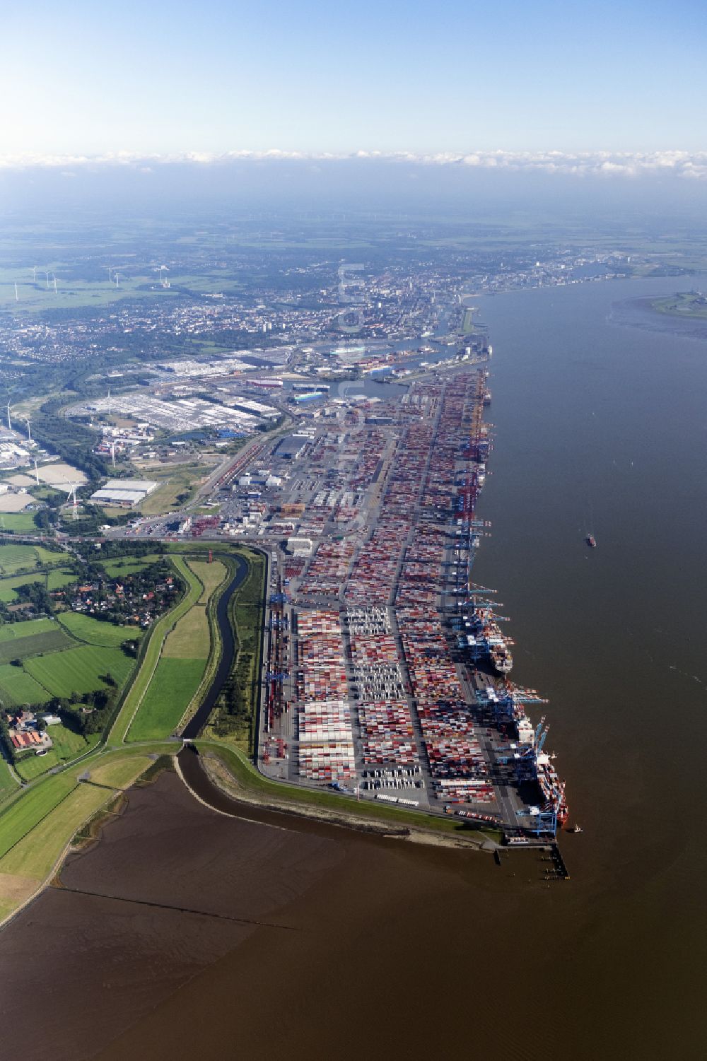 Aerial image Bremerhaven - Docks and terminals with warehouses and freight forwarding and logistics companies by the mouth of the Weser in Bremerhaven in the state Bremen