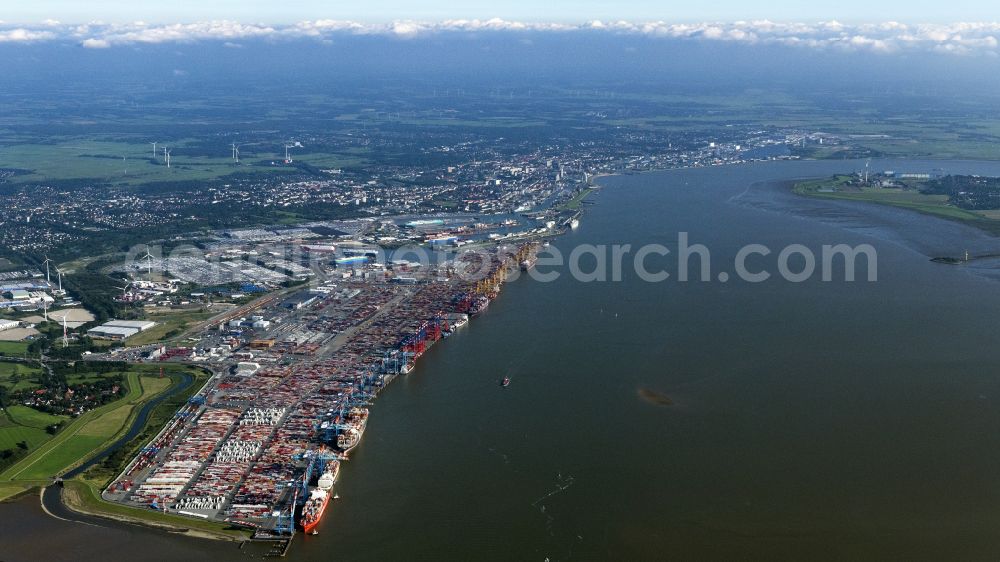 Bremerhaven from above - Docks and terminals with warehouses and freight forwarding and logistics companies by the mouth of the Weser in Bremerhaven in the state Bremen