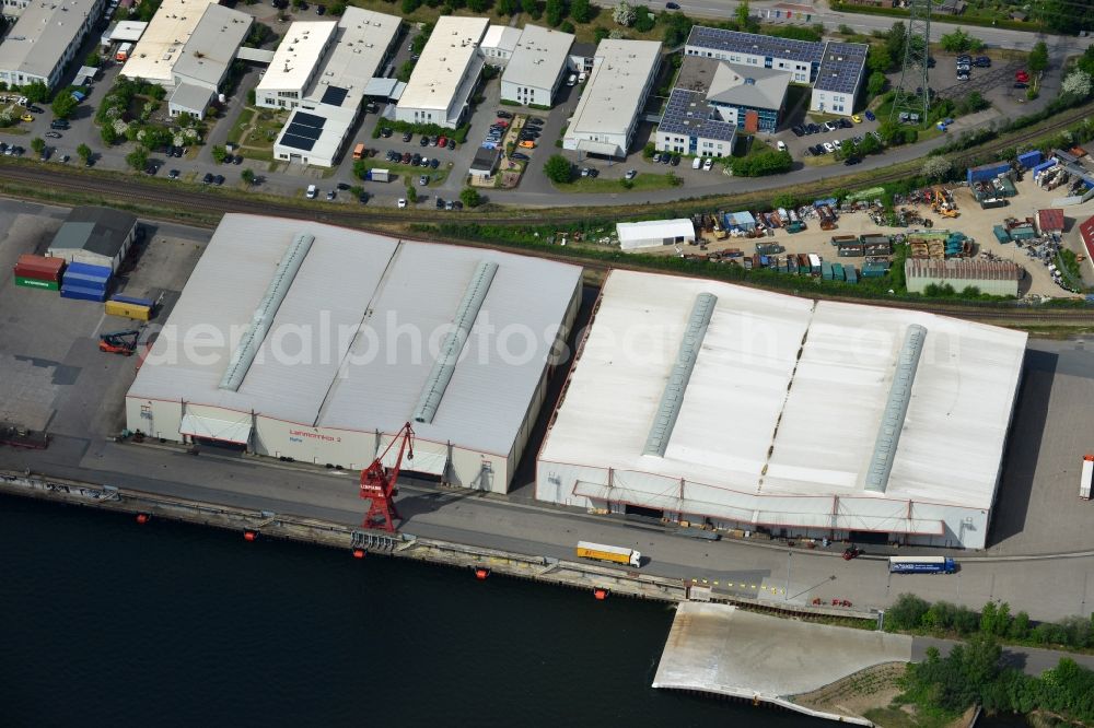 Aerial image Lübeck - Docks and terminals with warehouses and freight forwarding and logistics companies in Luebeck in the state Schleswig-Holstein