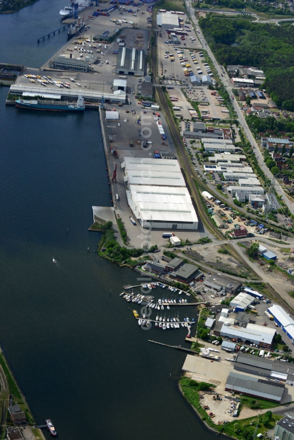 Lübeck from above - Docks and terminals with warehouses and freight forwarding and logistics companies in Luebeck in the state Schleswig-Holstein