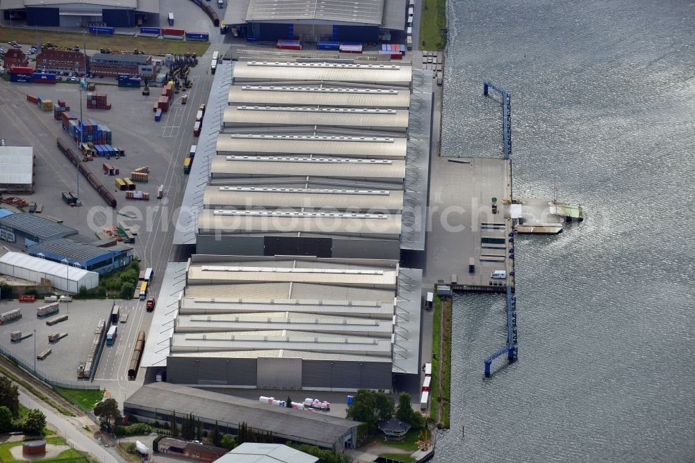 Aerial image Lübeck - Docks and terminals with warehouses and freight forwarding and logistics companies in Luebeck in the state Schleswig-Holstein