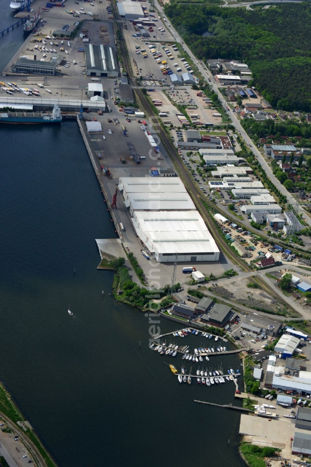 Lübeck from the bird's eye view: Docks and terminals with warehouses and freight forwarding and logistics companies in Luebeck in the state Schleswig-Holstein