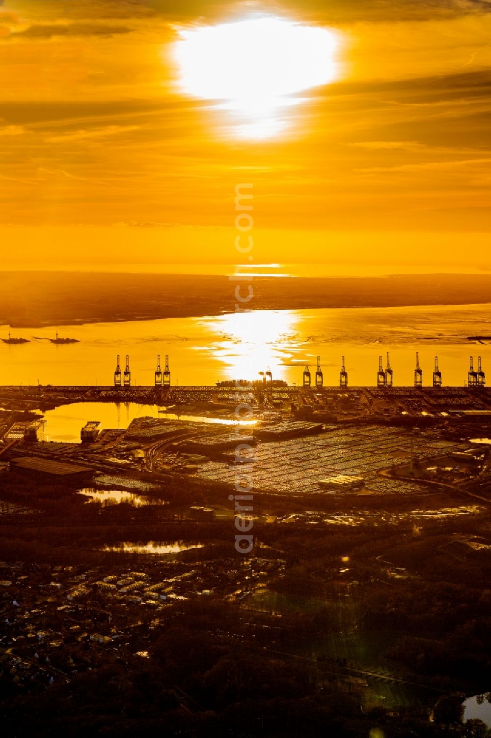 Bremerhaven from above - Docks and terminals with warehouses, freight forwarding and logistics companies and lots of containers by the mouth of the Weser in Bremerhaven in the state Bremen