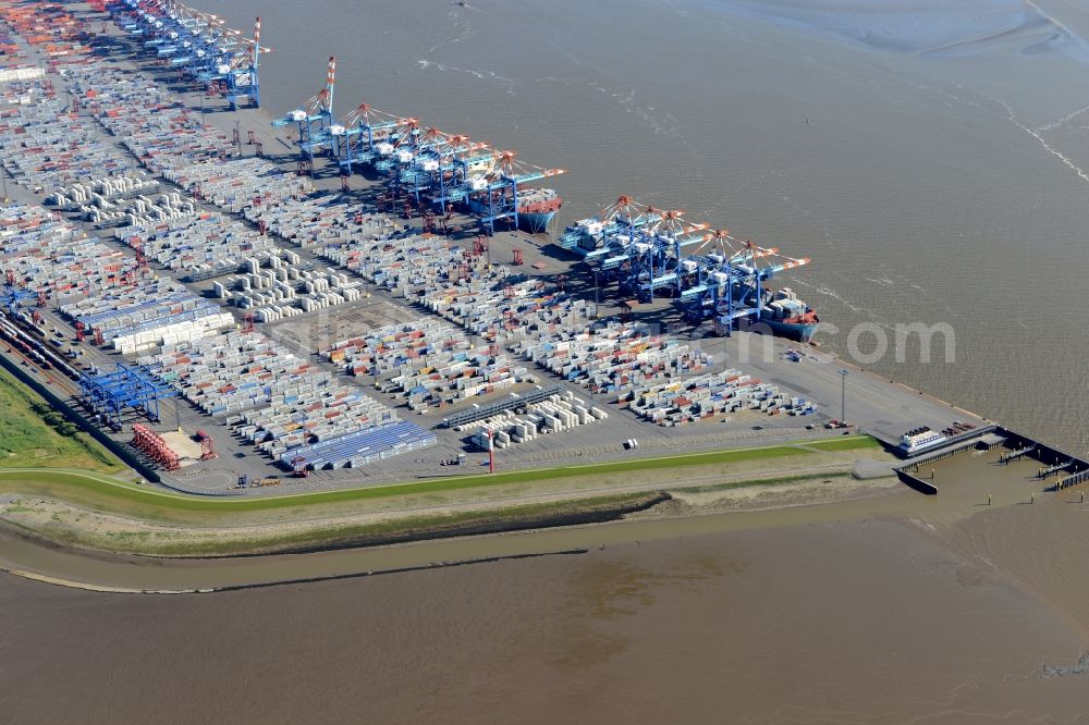 Aerial image Bremerhaven - Docks and terminals with warehouses, freight forwarding and logistics companies and lots of containers by the mouth of the Weser in Bremerhaven in the state Bremen