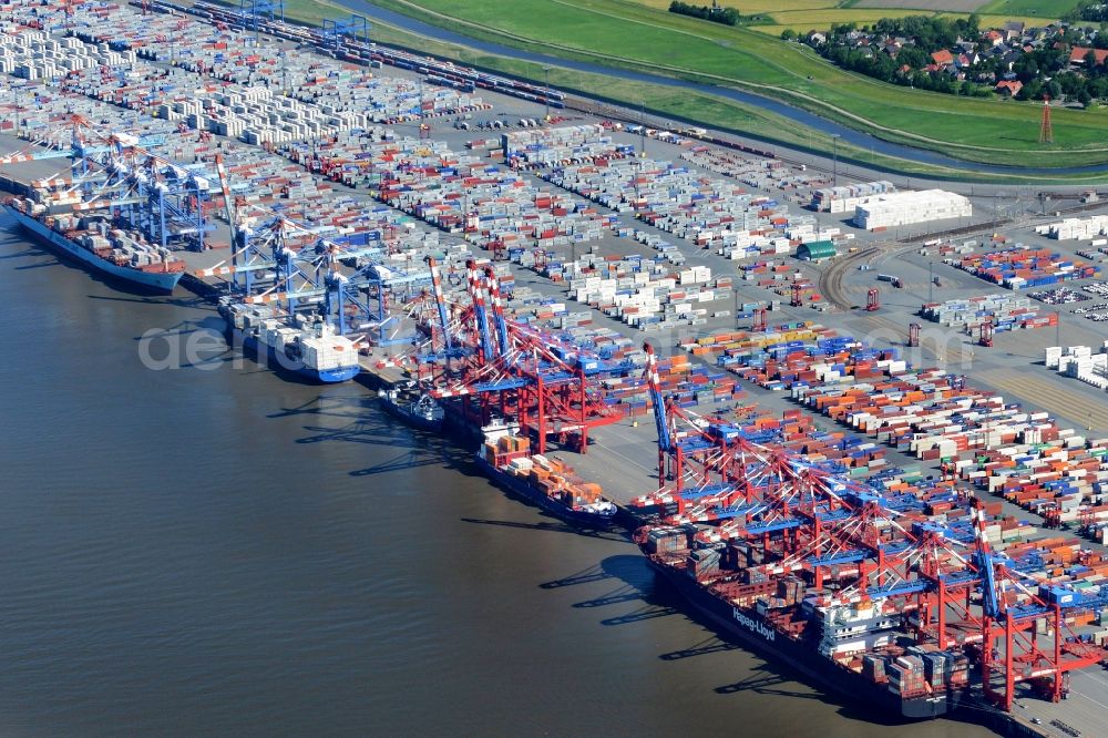 Aerial image Bremerhaven - Docks and terminals with warehouses, freight forwarding and logistics companies and lots of containers by the mouth of the Weser in Bremerhaven in the state Bremen