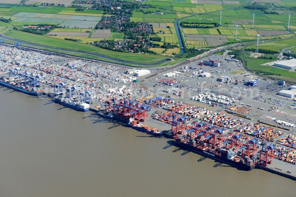 Aerial photograph Bremerhaven - Docks and terminals with warehouses, freight forwarding and logistics companies and lots of containers by the mouth of the Weser in Bremerhaven in the state Bremen