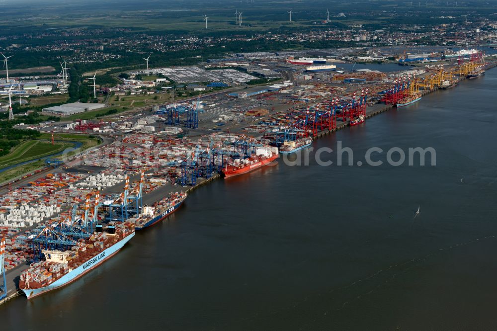 Aerial image Bremerhaven - Docks and terminals with warehouses, freight forwarding and logistics companies and lots of containers by the mouth of the Weser in Bremerhaven in the state Bremen