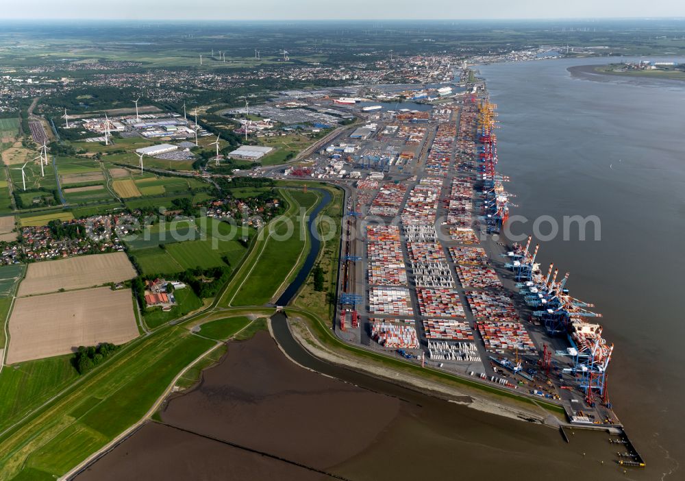 Aerial photograph Bremerhaven - Docks and terminals with warehouses, freight forwarding and logistics companies and lots of containers by the mouth of the Weser in Bremerhaven in the state Bremen