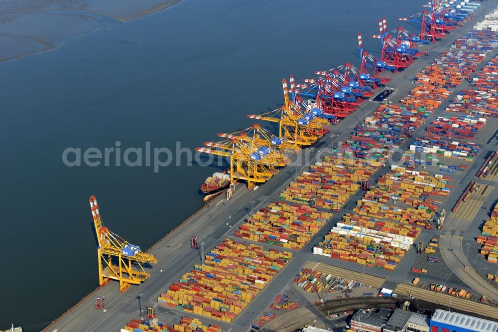 Bremerhaven from above - Docks and terminals with warehouses and freight forwarding and logistics companies by the mouth of the Weser in Bremerhaven in the state Bremen