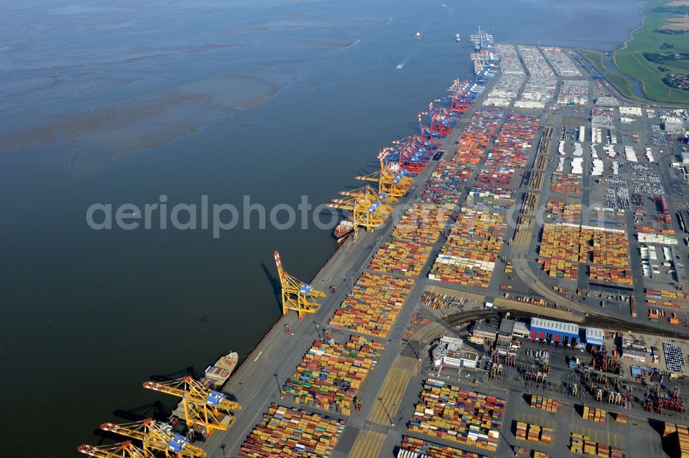 Bremerhaven from the bird's eye view: Docks and terminals with warehouses and freight forwarding and logistics companies by the mouth of the Weser in Bremerhaven in the state Bremen