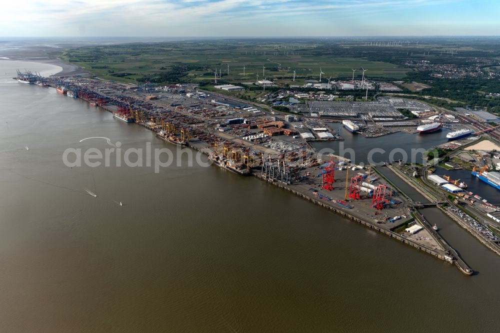 Bremerhaven from the bird's eye view: Docks and terminals with warehouses and freight forwarding and logistics companies by the mouth of the Weser in Bremerhaven in the state Bremen