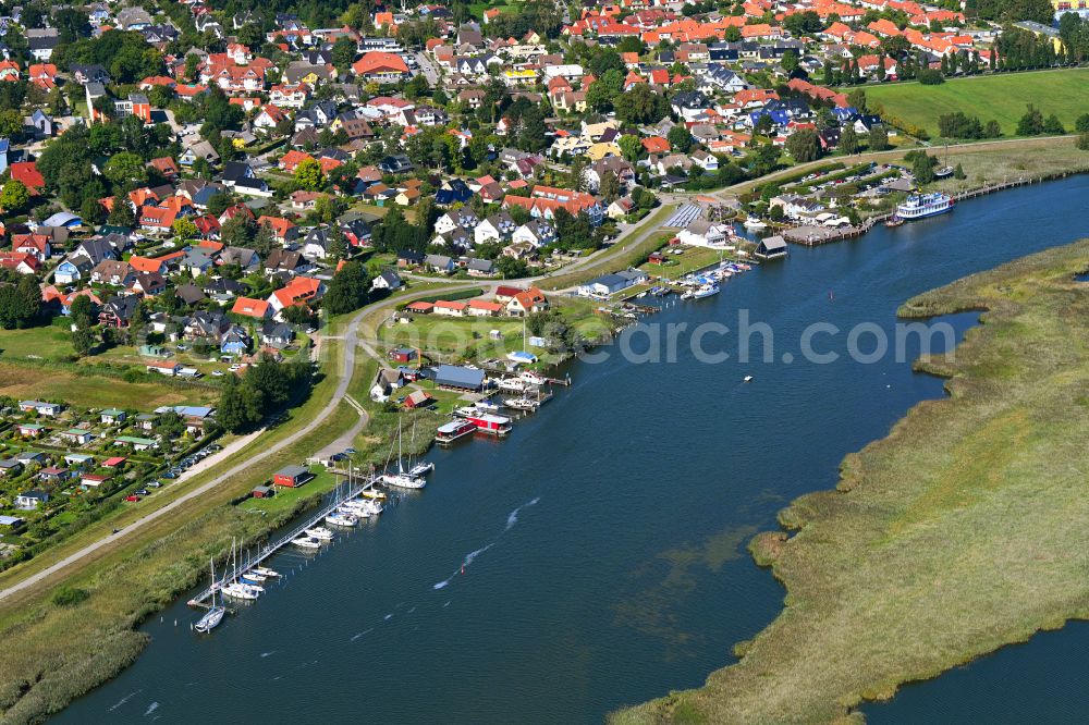 Zingst from the bird's eye view: Port facilities on the shore of the Barther Bodden in Zingst in the federal state of Mecklenburg-Vorpommern, Germany