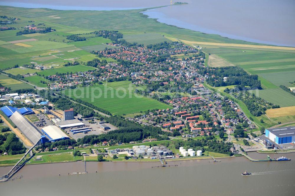 Aerial image Nordenham - Port facilities on the banks of the river course of the Weser in Nordenham in the state Lower Saxony