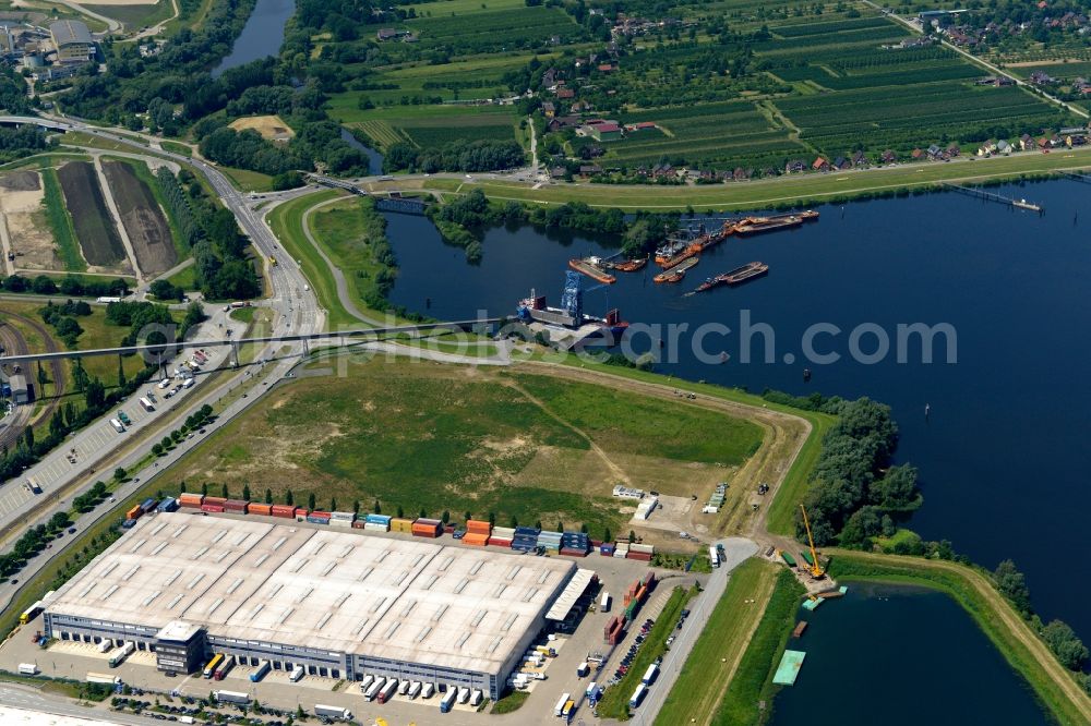 Hamburg from above - Port facilities on the shores of the harbor of Dradenauhafen on Finkenwerder Strasse in Hamburg in Germany