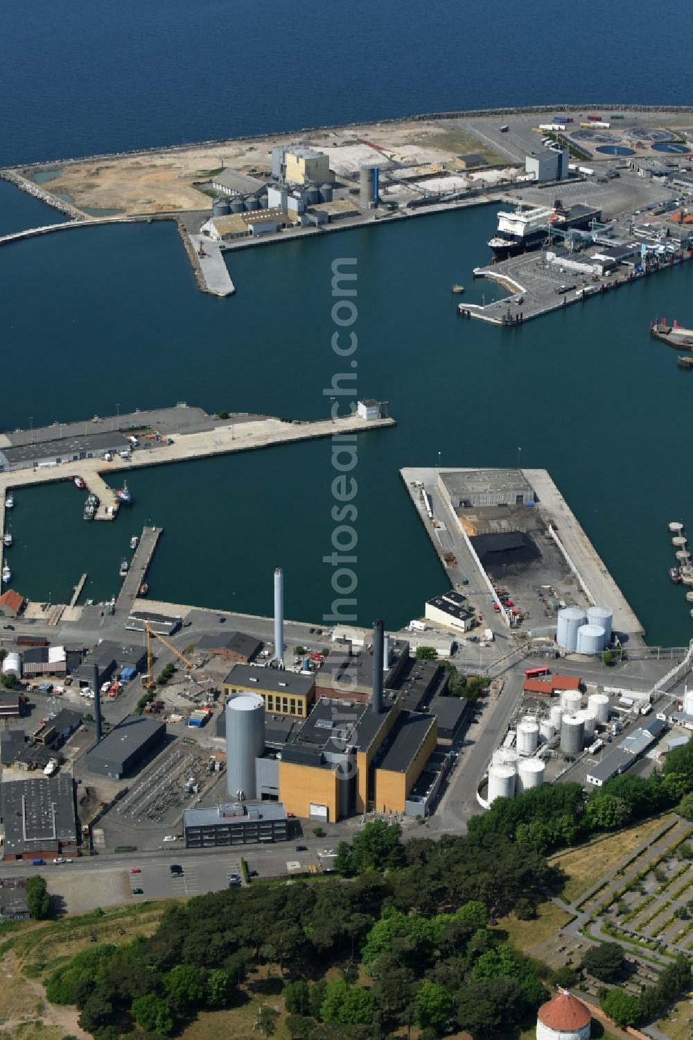 Ronne - Insel Bornholm from above - Port facilities on the shores of the harbor of Ferry and freight port of the island of Bornholm in Roenne in Region Hovedstaden, Denmark