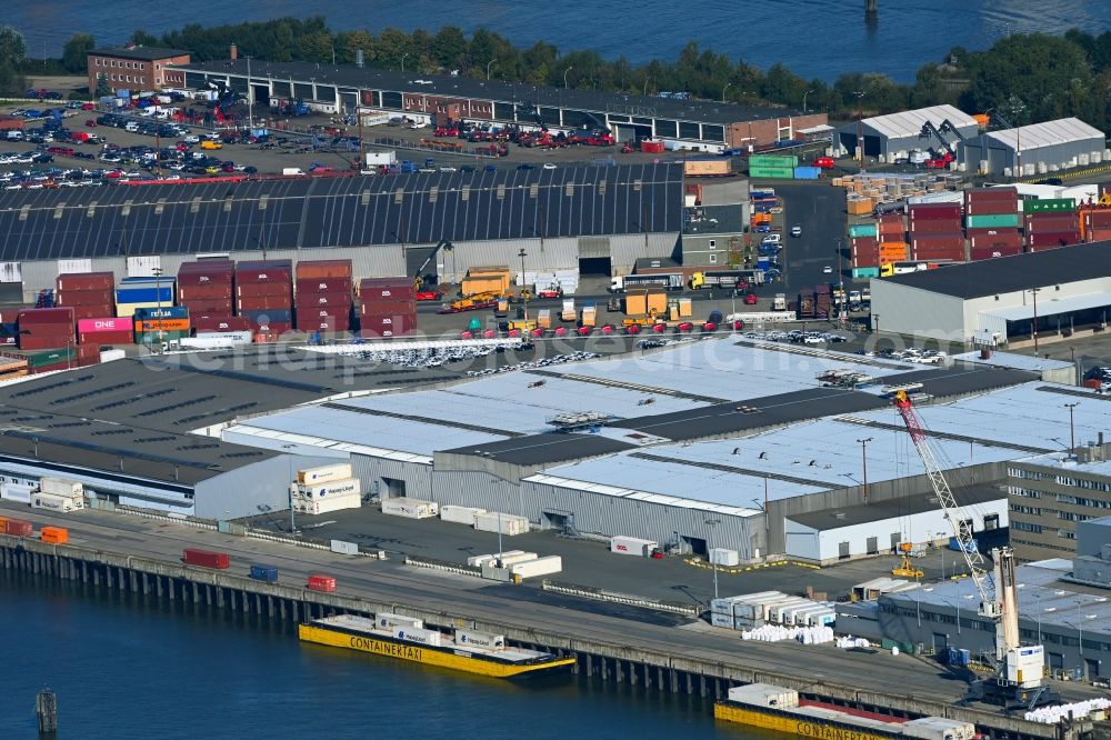 Hamburg from the bird's eye view: Port facilities on the shores of the harbor of Kleiner Grasbrook with logistic halls in Hamburg, Germany