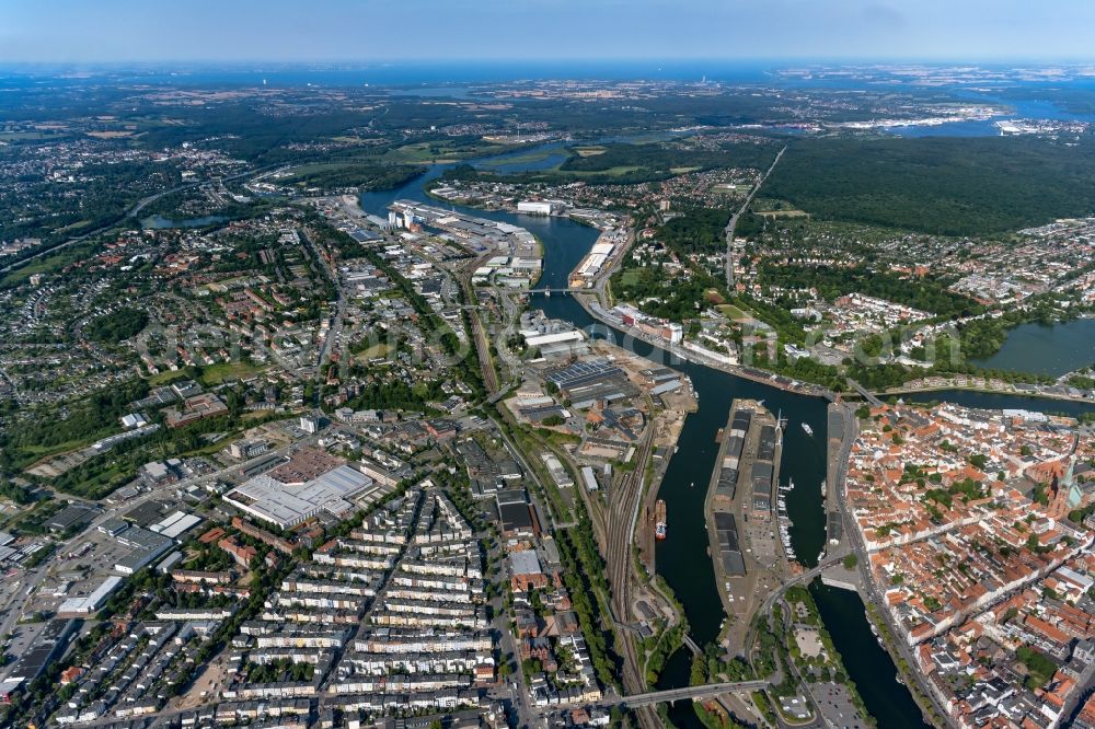 Lübeck from above - Port facilities on the shores of the harbor of on Willy-Brandt-Allee on Trave in Luebeck in the state Schleswig-Holstein, Germany