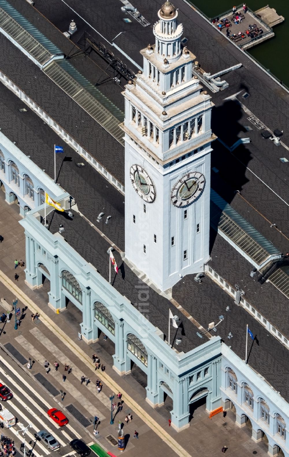 Aerial photograph San Francisco - Port facilities and white clock tower on the shores of the harbor of des Ferry Terminal in San Francisco in USA