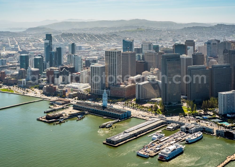 San Francisco from the bird's eye view: Port facilities and white clock tower on the shores of the harbor of des Ferry Terminal in San Francisco in USA