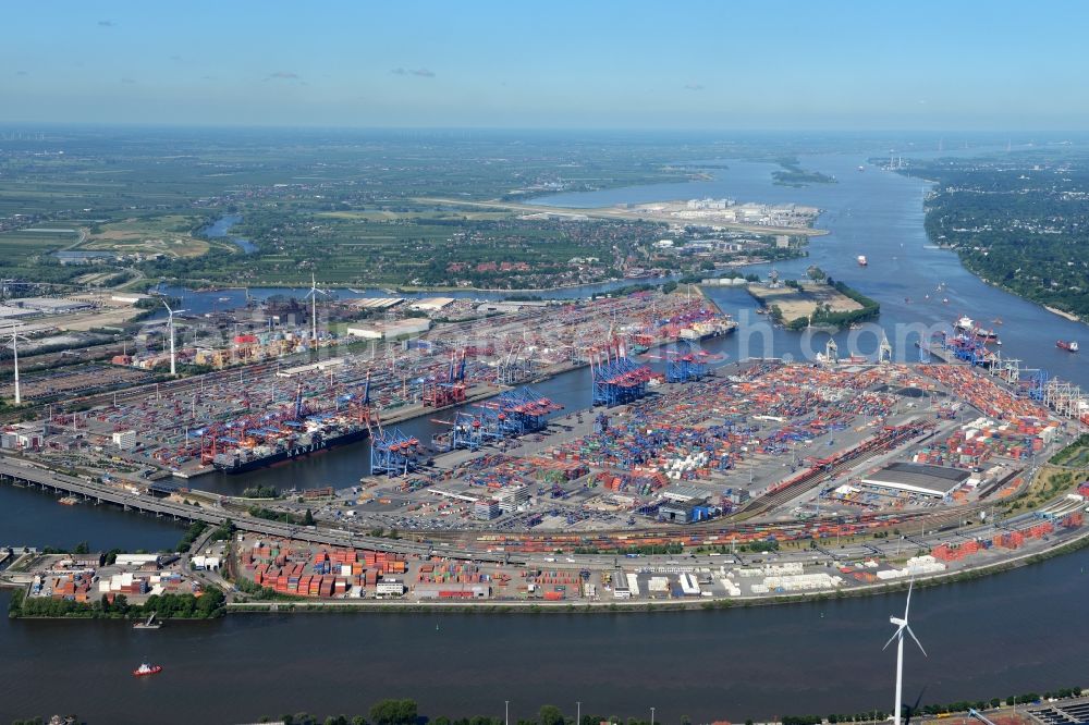 Hamburg from the bird's eye view: Port Waltershof facilities on the banks of the river course of the Elbe - Norderelbe in Hamburg in Germany