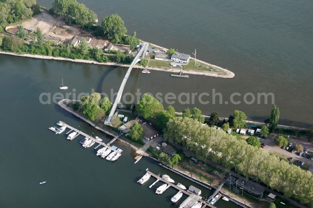 Wiesbaden from above - The narrow harbor entrance to the Rhine is spanned by the Dyckerhoff Bridge (pedestrian bridge). Furthermore, boat moorings and a water rescue service of the DLRG circle group Wiesbaden and Schierstein e.V. watch. Located on the Rhine yacht harbor is located in Schierstein district in Wiesbaden in Hesse. wiesbaden.dlrg.de