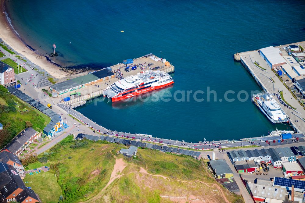 Helgoland from above - Ship moorings at the harbor basin of the inland port for passenger ships and ferries on street Am Suedstrand in Helgoland in the state Schleswig-Holstein, Germany