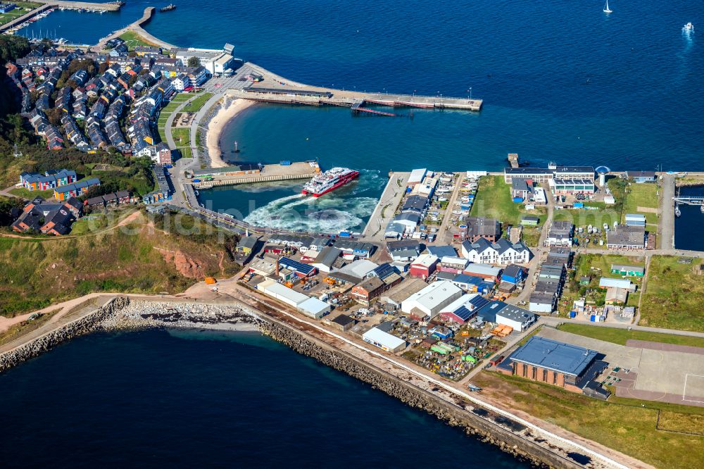 Helgoland from above - Ship moorings at the harbor basin of the inland port for passenger ships and ferries on street Am Suedstrand in Helgoland in the state Schleswig-Holstein, Germany