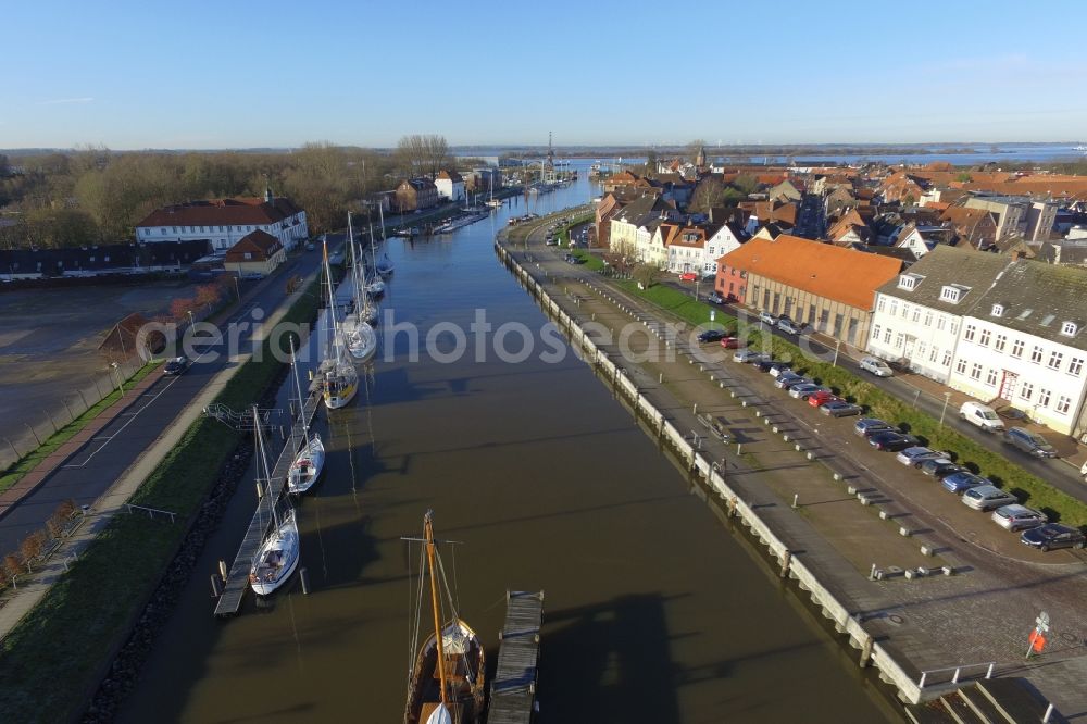 Glückstadt from above - Pleasure boat marina with docks and moorings on the shore area in Glueckstadt in the state Schleswig-Holstein