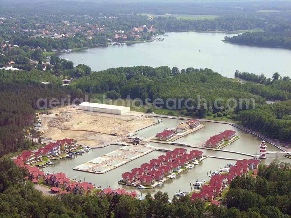 Aerial photograph Rheinsberg - Rheinsberg / Brandenburg Blick auf das fast fertige Hafendorf Rheinsberg - Projektgesellschaft Hafendorf Rheinsberg GmbH,Lenaustr. 27,D-12305 Berlin,Telefon: +49 33931/34 161,Telefax: +49 33931/34 163,Email: info@hafendorf-rheinsberg.de,Achim Walder: