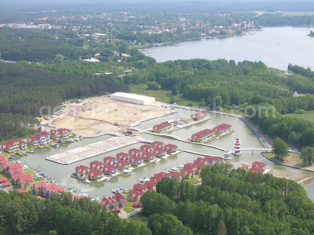 Rheinsberg from above - Rheinsberg / Brandenburg Blick auf das fast fertige Hafendorf Rheinsberg - Projektgesellschaft Hafendorf Rheinsberg GmbH,Lenaustr. 27,D-12305 Berlin,Telefon: +49 33931/34 161,Telefax: +49 33931/34 163,Email: info@hafendorf-rheinsberg.de,Achim Walder: