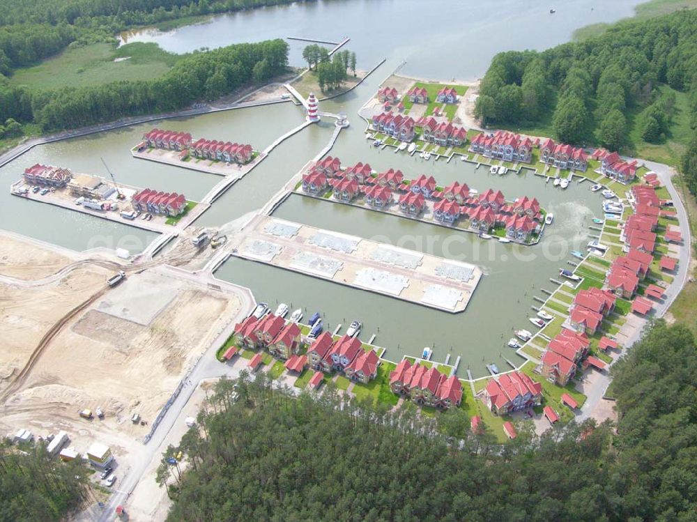 Aerial image Rheinsberg - Rheinsberg / Brandenburg Blick auf das fast fertige Hafendorf Rheinsberg - Projektgesellschaft Hafendorf Rheinsberg GmbH,Lenaustr. 27,D-12305 Berlin,Telefon: +49 33931/34 161,Telefax: +49 33931/34 163,Email: info@hafendorf-rheinsberg.de,Achim Walder: