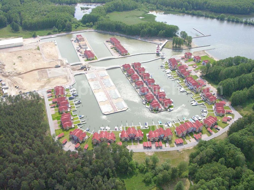 Aerial photograph Rheinsberg - Rheinsberg / Brandenburg Blick auf das fast fertige Hafendorf Rheinsberg - Projektgesellschaft Hafendorf Rheinsberg GmbH,Lenaustr. 27,D-12305 Berlin,Telefon: +49 33931/34 161,Telefax: +49 33931/34 163,Email: info@hafendorf-rheinsberg.de,Achim Walder: