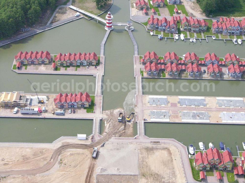 Rheinsberg from above - Rheinsberg / Brandenburg Blick auf das fast fertige Hafendorf Rheinsberg - Projektgesellschaft Hafendorf Rheinsberg GmbH,Lenaustr. 27,D-12305 Berlin,Telefon: +49 33931/34 161,Telefax: +49 33931/34 163,Email: info@hafendorf-rheinsberg.de,Achim Walder: