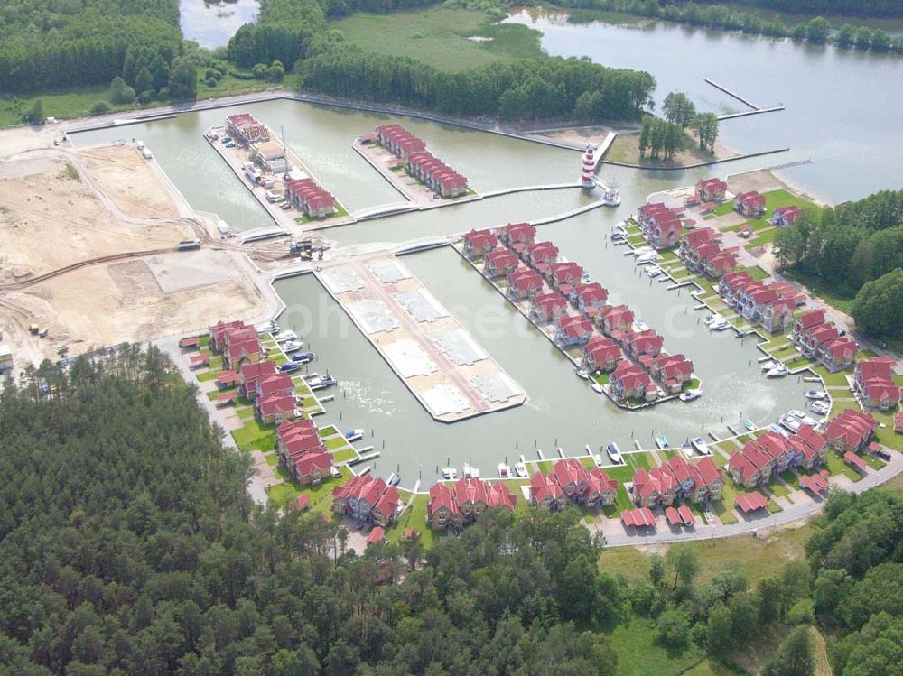 Aerial image Rheinsberg - Rheinsberg / Brandenburg Blick auf das fast fertige Hafendorf Rheinsberg - Projektgesellschaft Hafendorf Rheinsberg GmbH,Lenaustr. 27,D-12305 Berlin,Telefon: +49 33931/34 161,Telefax: +49 33931/34 163,Email: info@hafendorf-rheinsberg.de,Achim Walder: