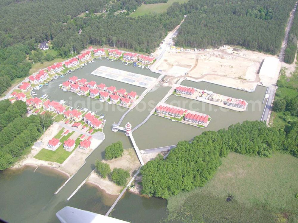 Rheinsberg from above - Rheinsberg / Brandenburg Blick auf das fast fertige Hafendorf Rheinsberg - Projektgesellschaft Hafendorf Rheinsberg GmbH,Lenaustr. 27,D-12305 Berlin,Telefon: +49 33931/34 161,Telefax: +49 33931/34 163,Email: info@hafendorf-rheinsberg.de,Achim Walder: