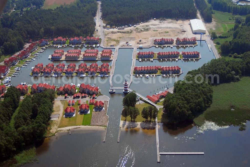 Aerial image Rheinsberg - Blick auf das fast fertige Hafendorf Rheinsberg - Projektgesellschaft Hafendorf Rheinsberg GmbH,Lenaustr. 27,D-12305 Berlin,Telefon: +49 33931/34 161,Telefax: +49 33931/34 163,Email: info@hafendorf-rheinsberg.de,Achim Walder: