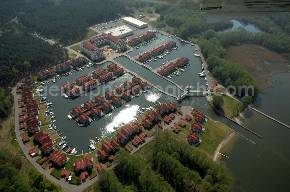 RHEINSBERG from the bird's eye view: Blick auf das fertige Hafendorf Rheinsberg - Projektgesellschaft Hafendorf Rheinsberg GmbH,Lenaustr. 27,D-12305 Berlin,Telefon: +49 33931/34 161,Telefax: +49 33931/34 163,Email: info@hafendorf-rheinsberg.de,Achim Walder: