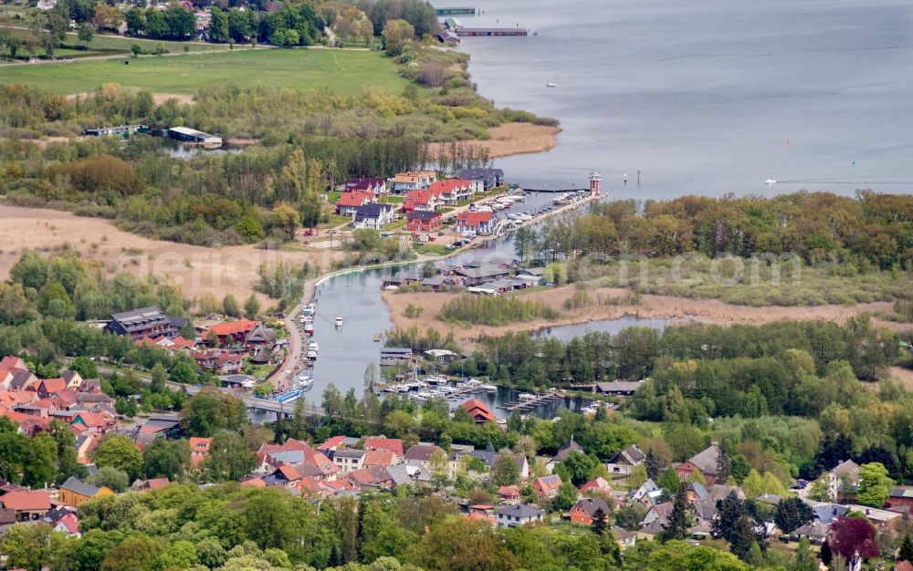 Plau am See from the bird's eye view: Pleasure boat marina with docks and moorings on the shore area of Plauer See in Plau am See in the state Mecklenburg - Western Pomerania