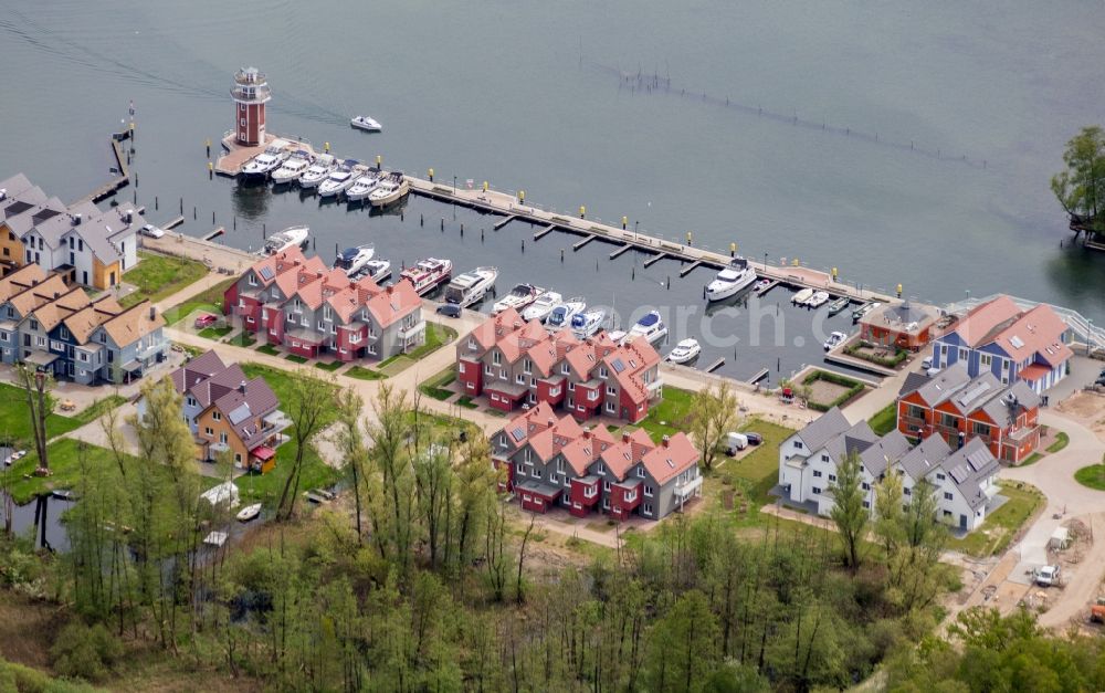 Aerial photograph Plau am See - Pleasure boat marina with docks and moorings on the shore area of Plauer See in Plau am See in the state Mecklenburg - Western Pomerania