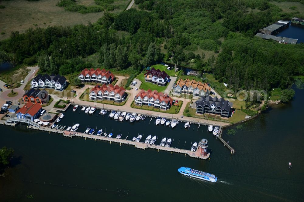 Plau am See from above - Pleasure boat marina with docks and moorings on the shore area of Plauer See in Plau am See in the state Mecklenburg - Western Pomerania