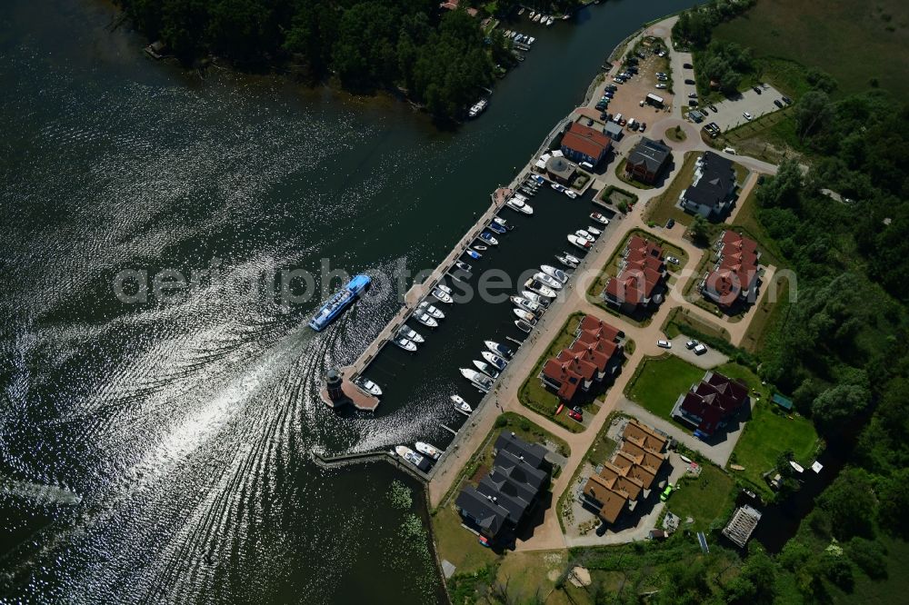 Aerial photograph Plau am See - Pleasure boat marina with docks and moorings on the shore area of Plauer See in Plau am See in the state Mecklenburg - Western Pomerania