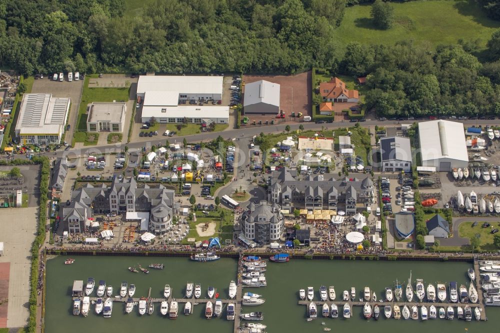 Aerial photograph Bergkamen - View of the yacht harbor at Marina Rünthe at the Datteln-Hamm canal in Bergkamen in North Rhine-Westphalia. It was built in 1939 as the port of the coal mine Werne. Then in 1995, was the conversion as a yacht harbor