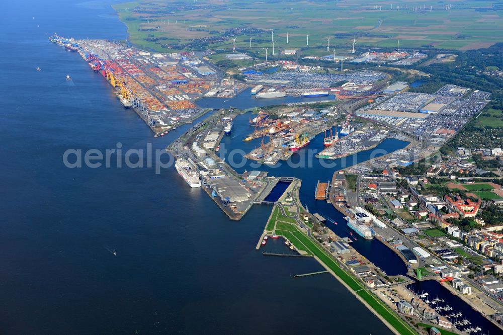 Bremerhaven from the bird's eye view: Port area with port facilities and storage space at the mouth of the river Weser joining the North Sea in Bremerhaven in the state Bremen