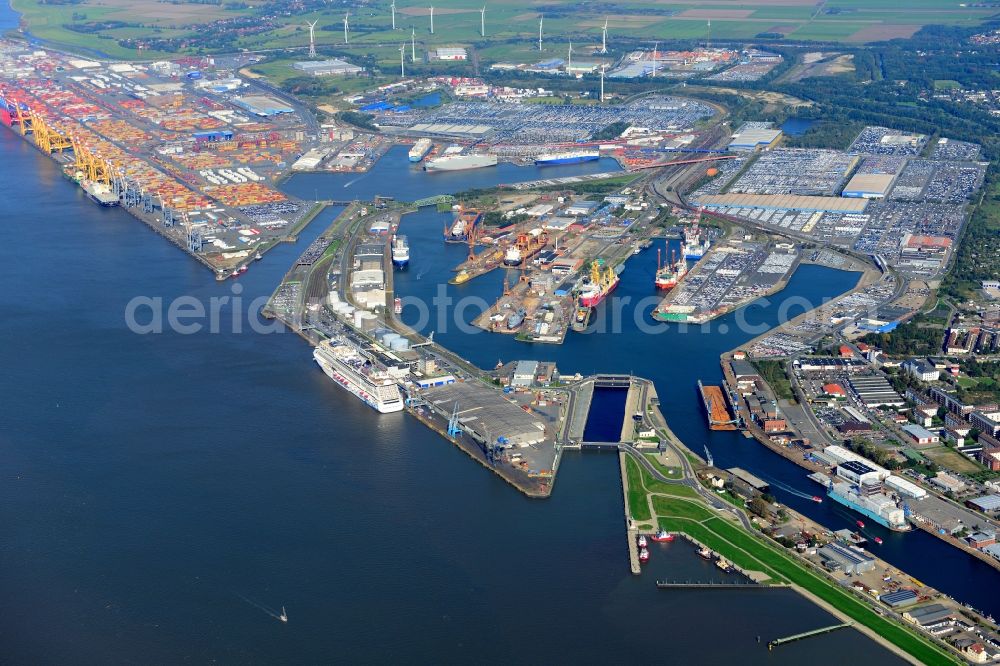 Aerial image Bremerhaven - Port area with port facilities and storage space at the mouth of the river Weser joining the North Sea in Bremerhaven in the state Bremen