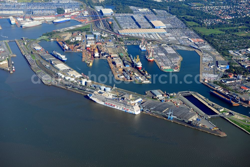 Bremerhaven from the bird's eye view: Port area with port facilities and storage space at the mouth of the river Weser joining the North Sea in Bremerhaven in the state Bremen