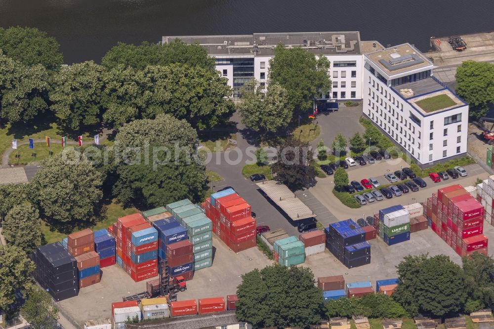 Aerial photograph Duisburg - View of the port of Duisburg in the state North Rhine-Westphalia.On display are various transportable containers at the port channel and the freight railroad tracks