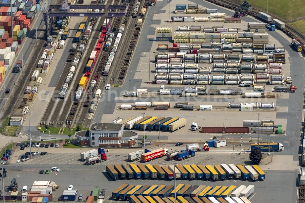 Duisburg from the bird's eye view: View of the port of Duisburg in the state North Rhine-Westphalia.On display are various transportable containers at the port channel and the freight railroad tracks