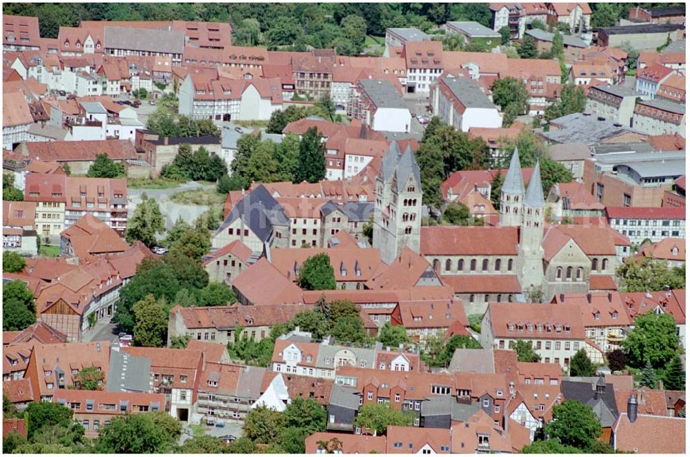 Aerial photograph Halberstadt - 22.08.2004, Halberstadt mit Blick auf die Liebfrauenkirche. Romanische viertürmige Pfeilebasilika, ehem. Augustiner Chorherrenstift von 1005 Gewölbemalereien, besterhaltene Stuckchorschranken nördlich der Alpen (von 1210). Das monumentale Triumphkreuz stamm aus dem Jahr 1230. Evang.-ref. Kirchengemeinde zu Liebfrauen Tel.: (0 39 41) 2 42 10