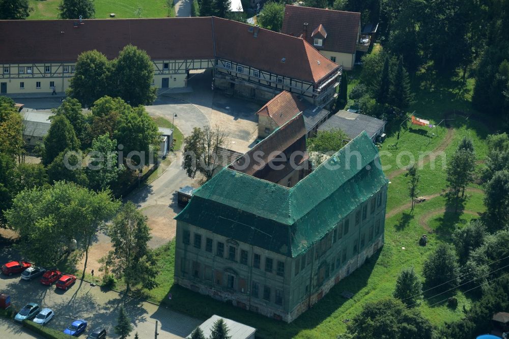 Langenleuba-Niederhain from above - Halbes Schloss Castle in the village centre of Langenleuba-Niederhain in the state of Thuringia. The historic building is being renovated