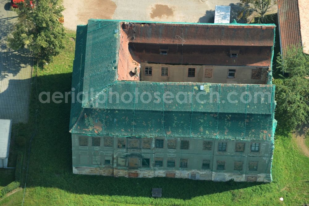 Langenleuba-Niederhain from above - Halbes Schloss Castle in the village centre of Langenleuba-Niederhain in the state of Thuringia. The historic building is being renovated